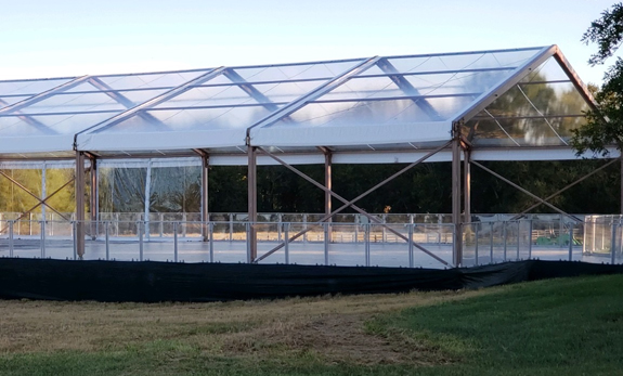 Temporary tent floor system with roof
